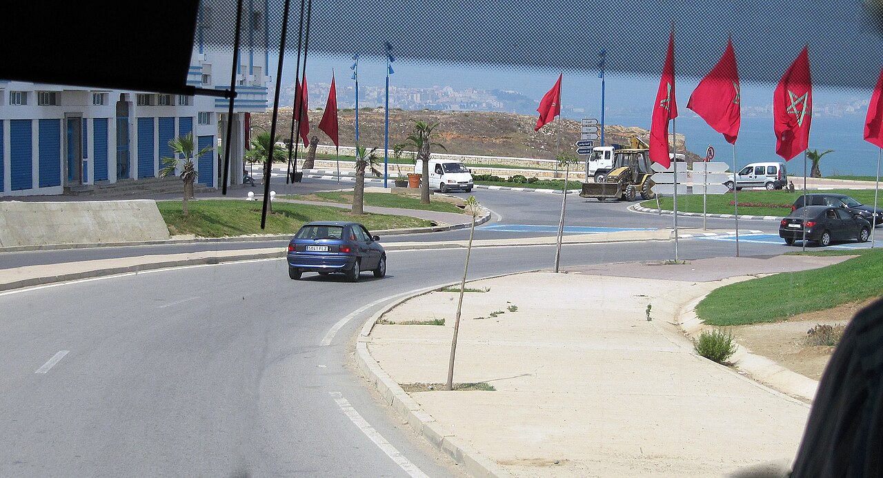 People walking through a city street, representing cross border movement